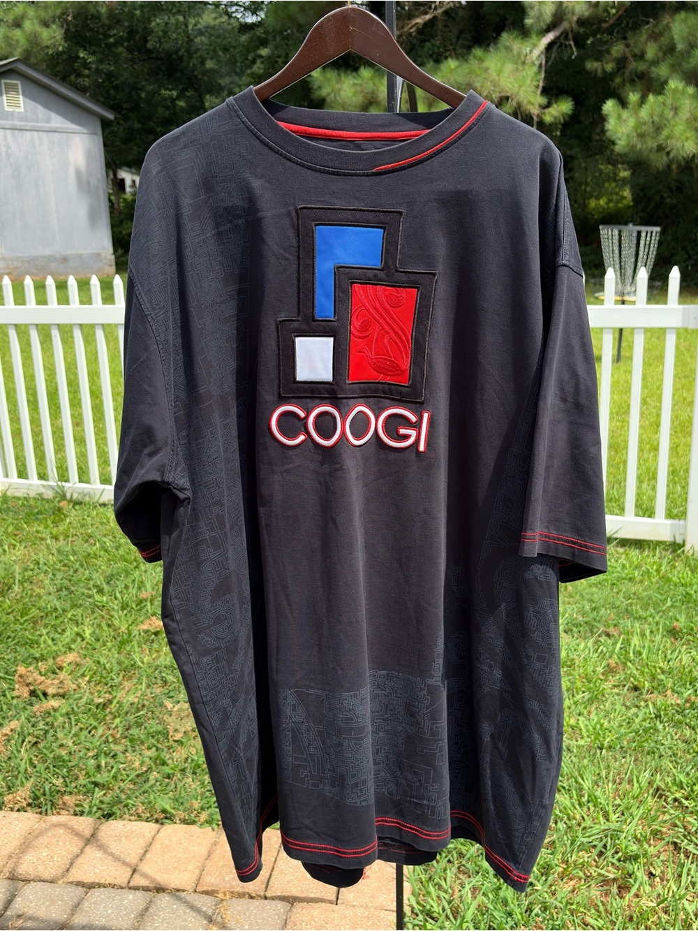COOGI Black Tee with Red, Blue & White Patchwork Logo